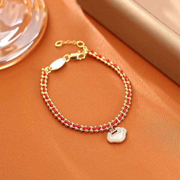 New National Trend Natural Fritillary Peace Lock Bracelet Zodiac Year High-end Simple Versatile Good Luck Woven Red String Jewelry