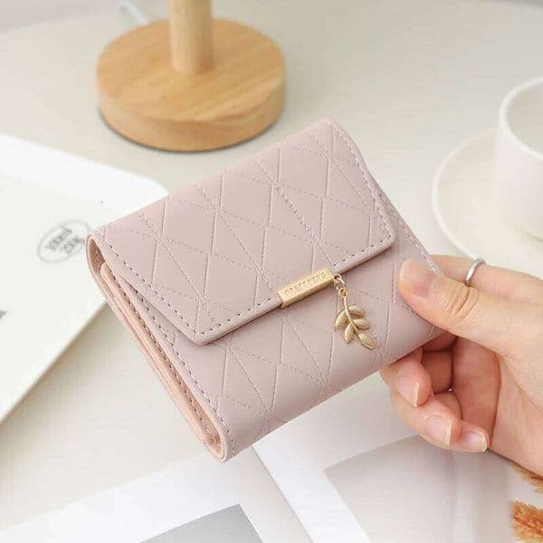 Autumn winter new women's short wallet Japan and South Korea small fresh PU simple folding hardware leaf pendant three fold Y260206