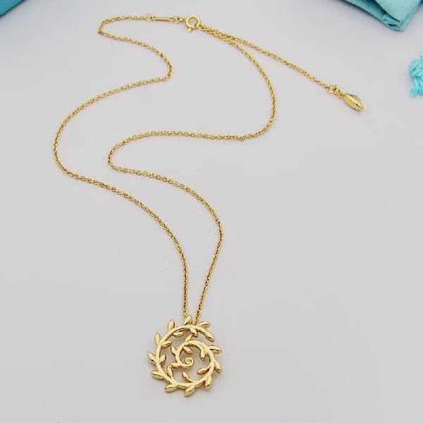 European and American fashion personality new hollow rotating ring olive leaves titanium steel luxury retro designer necklace with box.