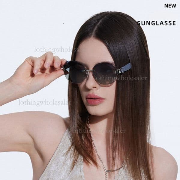 2026 Elliptical Frameless Designer Outdoor Glasses Luxury Brand Wave Shaped Clover Mirror Leg Sunglasses Women's Fashion Show Temperament Cycling Glasses