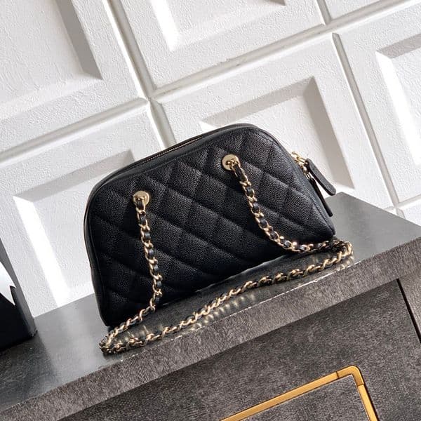 9A Designer Caviar Leather Chain Clutch with Rounded Silhouette Soft Grain Texture and Light Gold Hardware Elegant Minimal Daily Style