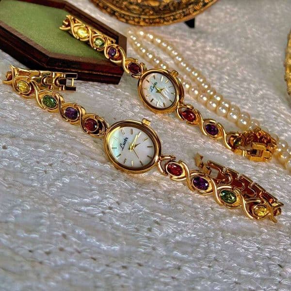 1pc New High-End Luxury Women's Watch Embedded With Colorful Tourmalines, Diamonds And An Oval Shaped Mother Of Pearl Dial. H260225