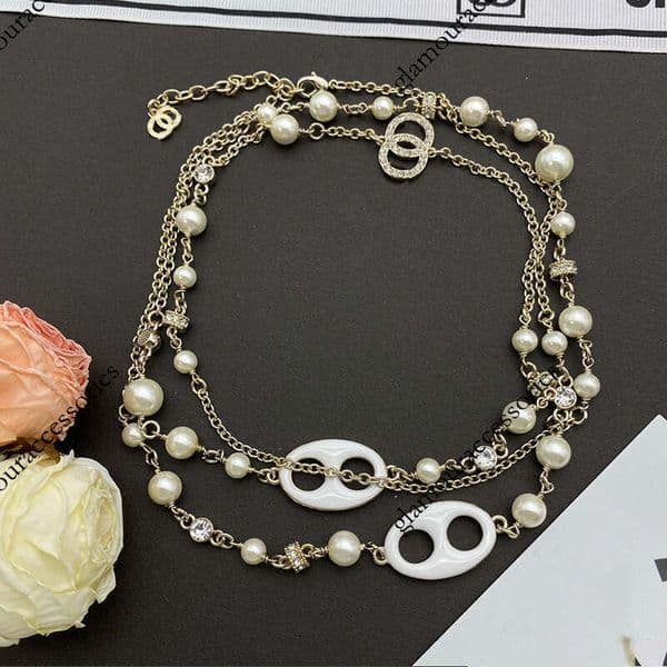 Designer jewelry cc necklace Luxurious socialite style red diamond inlaid pearl O necklace sweater chain