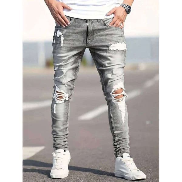Men's gray skinny jeans with large rips, featuring a unique distressed design that fits the body shape perfectly, making it easy 26Y0602