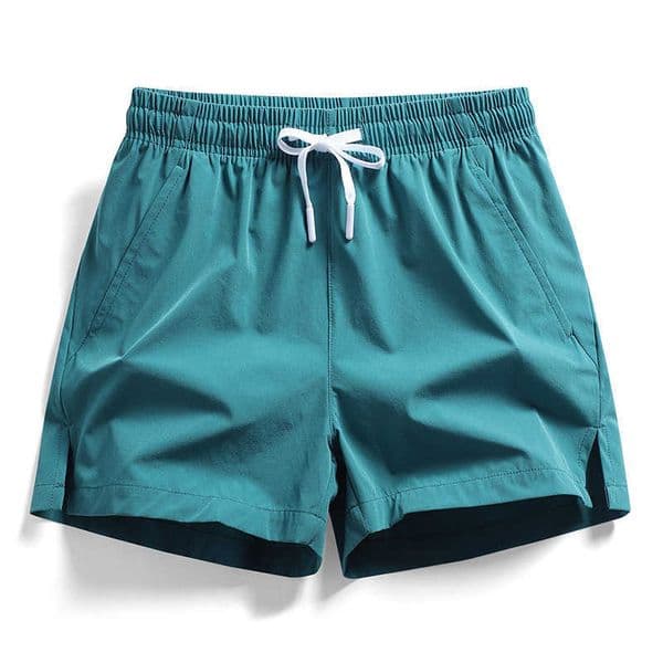 Split 2024 Summer Mens Casual Beach Shorts for Sports Fitness Running Elastic Quick Drying Ice Silk Solid Color Quick Drying M260605