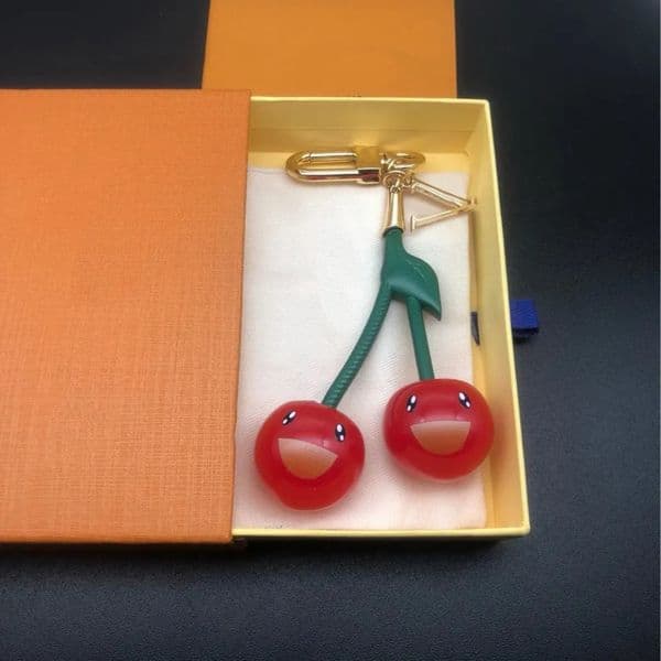 Cute Cherry Keychain With Gold Tone Hook And Green Strap Adorable Accessory For Bag Or Keyring Fun Gift For women
