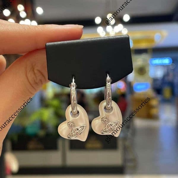 Designer Jewelry Vivi ennewestwood Earrings Queen Mother s new Saturn earrings are fashionable three dimensional heart shaped
