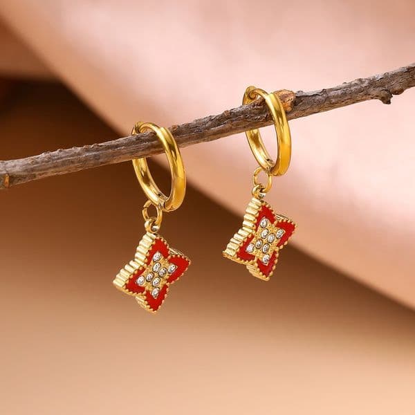Exclusive cross-border geometric micro-inlaid zircon four-leaf clover earrings, niche high-end light luxury style stainless steel oil-drip earrings