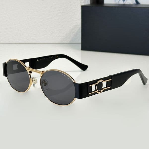 Mens and womens fashion round metal frame sunglasses luxurious designer hollowed out leg sunglasses color changing sun protection glasses with box VE2264