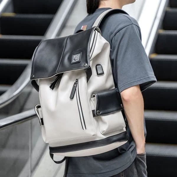 High quality leather backpack for men with USB charging casual travel waterproof backpack 15.6-inch laptop Mochila suitable for teenagers 240802
