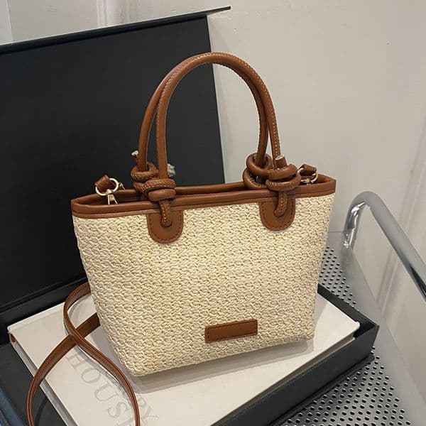 New Exquisite Weaving Beach New Holiday Travel Handheld fashion Vegetable Basket One Shoulder Straw Weaving Bucket Designer Crossbody Bag