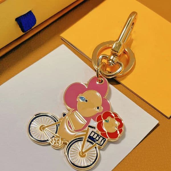 2024Handmade designer keychains multicolor key chain women men brown leather bag wallet lanyard plated gold accessories dragonne keychain letter 755535