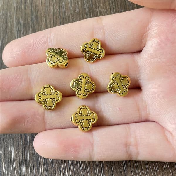 JunKang alloy antique silver gold perforated shell ethnic style four-corner logo gasket DIY bracelet necklace making accessories