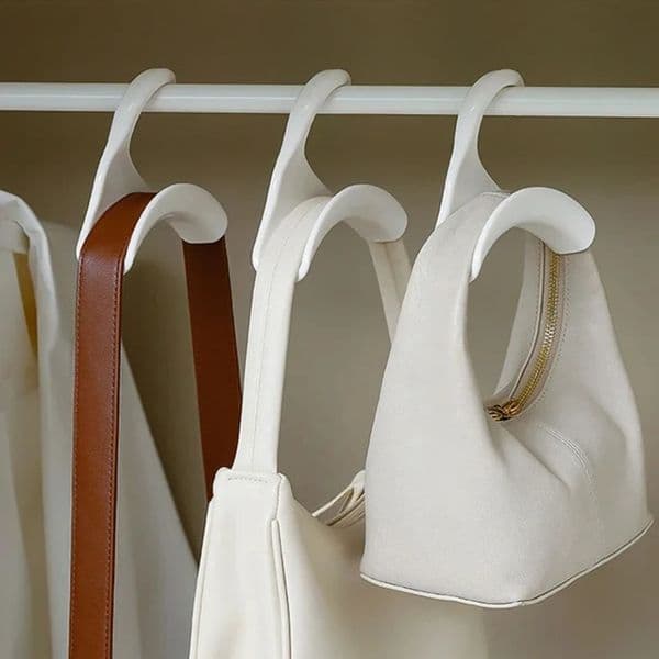 Durable Japanese style wardrobe rack with arched hanger hooks suitable for storing hats scarves shawls wallets and handbags 241008