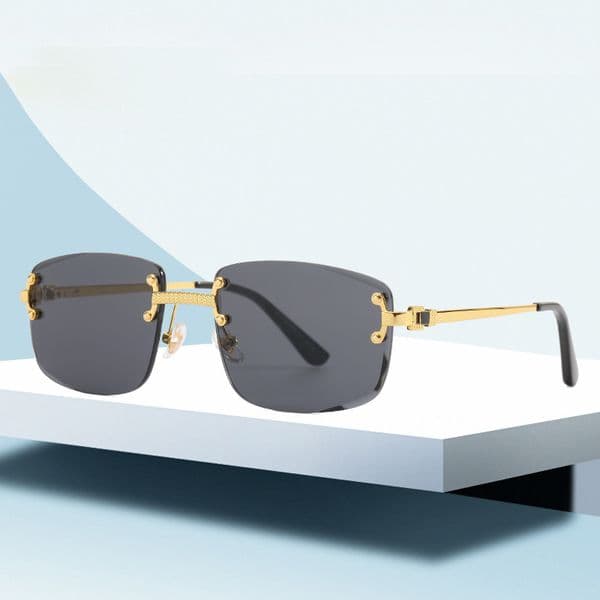 Designer Fashion Trendy Frameless Cut Edge Spring Foot Women's Net Red Fading Sunglasses Men's Street Shot UV400 Sunscreen