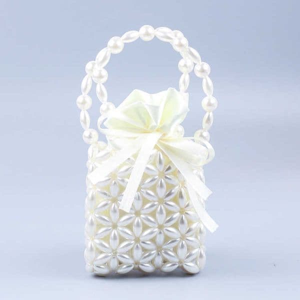 Net Red Women's Bag New Simple Oval Pearl Handbag Texture Western-style Hollow Woven Women's Handbag 230220