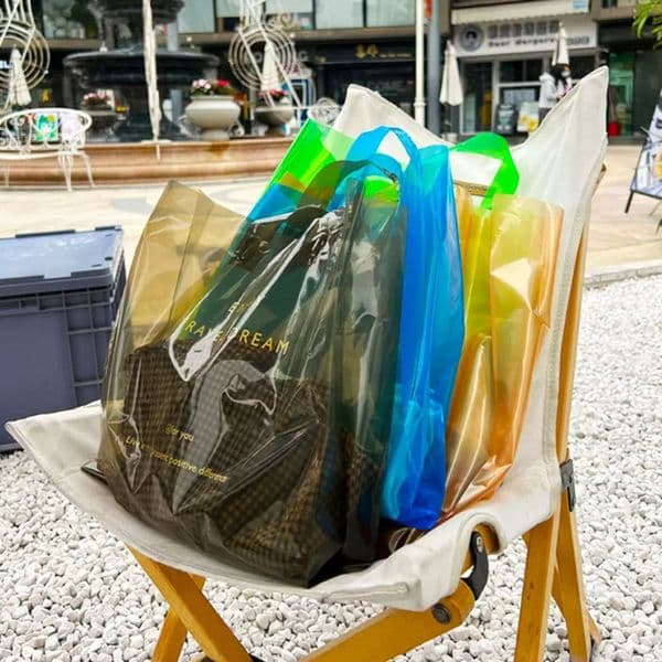 50pcs Plastic Gift Wrap With Handle Cartoon Cute Gift bag Large Letters Transparent Shopping Cloth Party candy Packaging Bags Wholesale