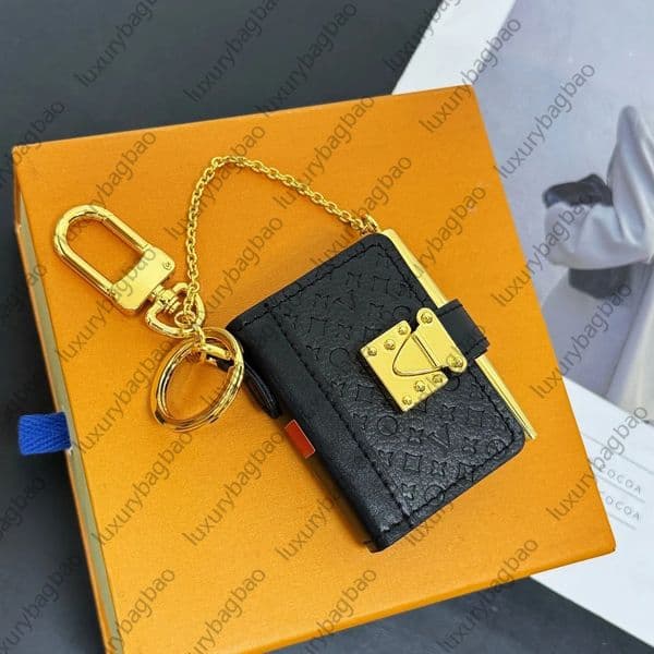 2025 luxury vintage fashion designer mini Notebook Ballpoint Pen Key Chain Set fashion business student mini Notepads sign pen Gifts decoration
