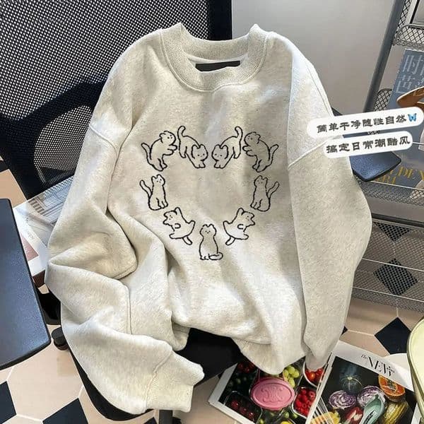 Korean version of cat print round neck sweater for men and women loose fitting casual couple autumn winter long sleeved 240617