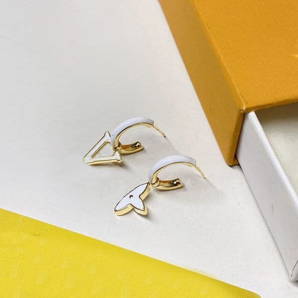 Gold Toned Asymmetric Stud Earrings with White Enamel Accents, Delicate & Playful Design for Daily Elegance or Subtle Party Charm, High - Quality S