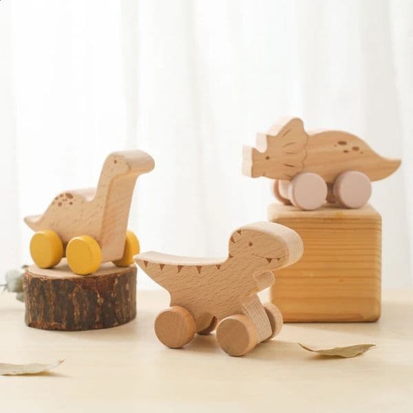 2026 New Beech Wooden Dinosaur Cartoon Car Teether cologne Educational Montessori perfume For Ren Teething Toys 250826 Designer