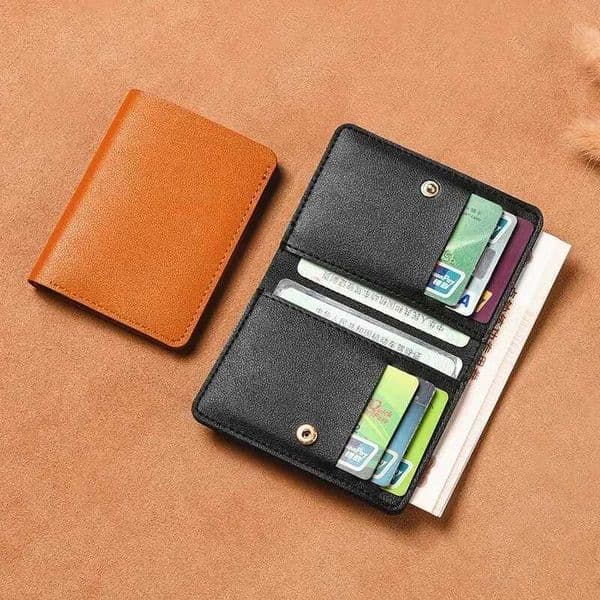 2024 New Womens Wallet Simplified Folding Button Small Wallet Drivers License Card Bag Male Student Soft Leather Wallet Z250527