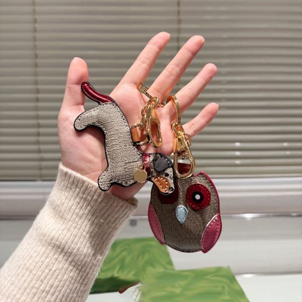 High Designer Bag pendant high Quality Handmade Leather dog Men's And Women's Bag Car Pendant Cartoon Animal Puppy Creative Keychain 250515