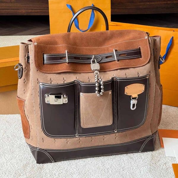 2026 Mens Womens Luxurys Designers Top-grade Cowhide Workwear Steamer Backpack Leather Shopping Bags Shouder Bag Upscale Outdoor Backpack 40cm