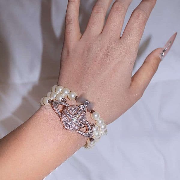 Viv west wood vivienneswestwood watch viviann watch Vivienwestwood Western Empress Style Three Layer Pearl Diamond Crushed Iced out Blue Saturn Women's Watch