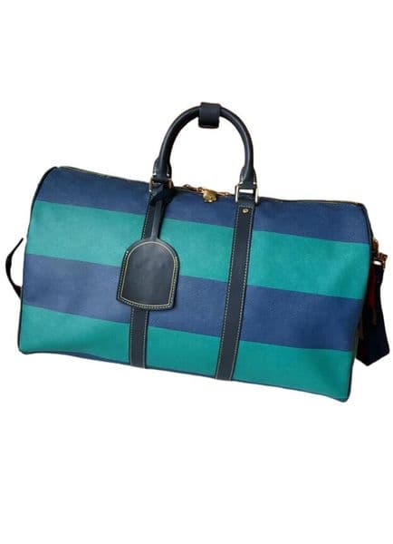 Hot designer duffle bag Men women fashion travel bag Large capcity Zipper open and close coated canvas leather hand shoulder crossbody travel bag tote bag AAA