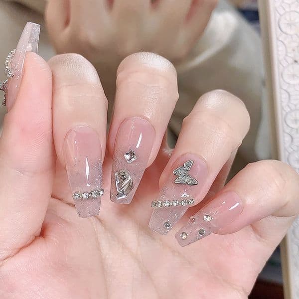 Elegant Hand Wearable Nail Phototherapy Finish Featuring Sparkling Butterflies