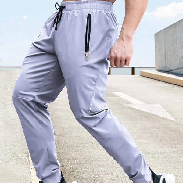 Mens Pants Summer Quickdrying Ice Silk Casual Ultrathin Elastic Ninepoint Loose Drape Solid Clothing 250703