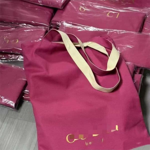 Brand shoulder bag fashionable gentle woman front and back dual-use strap letter printing canvas bag 2025 large capacity simple shopping casual storage bag