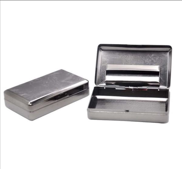 Metal smoking kit, moisture box, gun and black tobacco box.