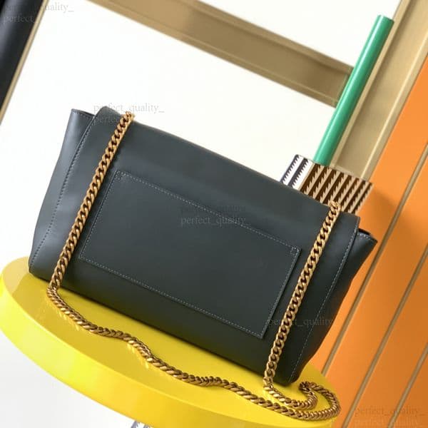 99A The handbag with a single shoulder strap and a slanted design, created by designer 12A, is made of high-quality leather and represents an exquisite classic piece.