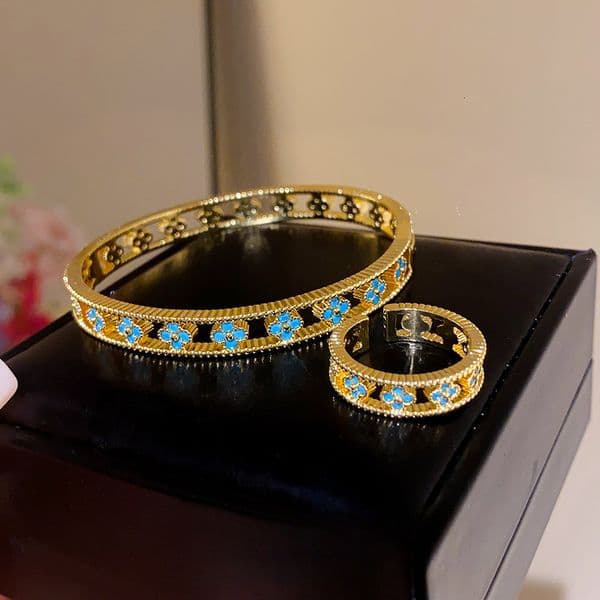 twopiece set 18k real gold plated vintage hollow lucky grass bracelet designer bracelet european and american fashion madam highend niche jewelry