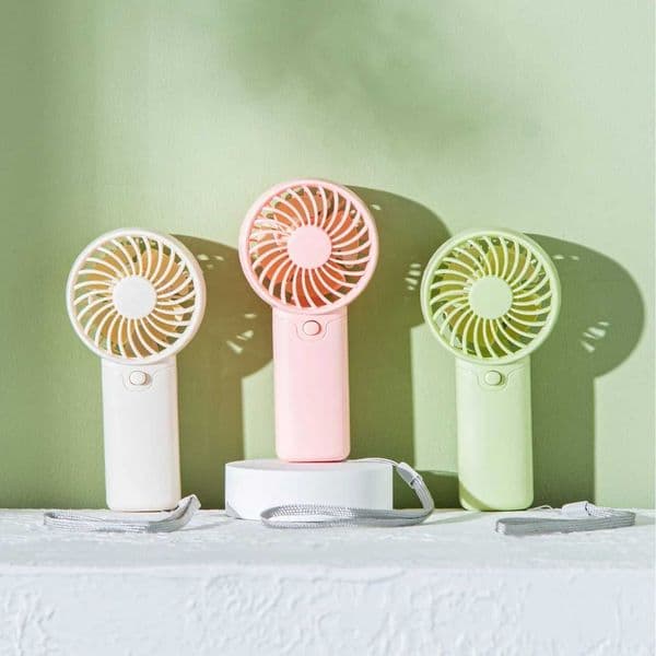 Multi color compact handheld fan with quiet operation portable design and one click control for home office and travelXJ250402