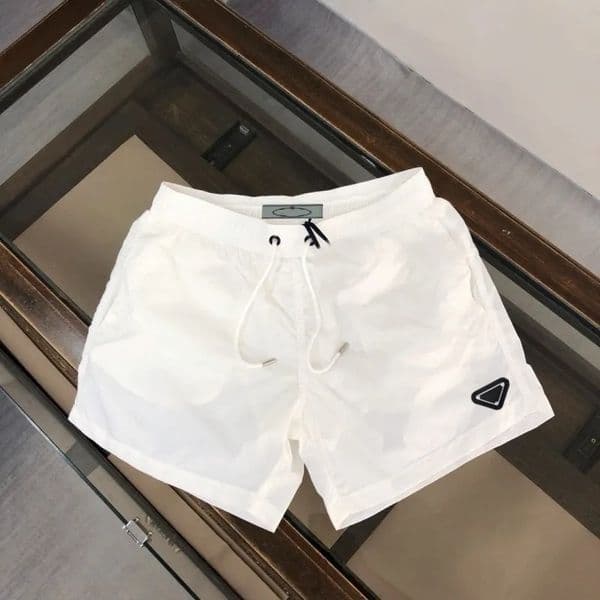 2025 Designer Mens Shorts Summer Thin Loose Straight Multi-Pocket Mens Casual Pants Black White Outdoor Running Sports Pants Hip Hop Short Harem Breeche Q260417