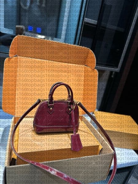 The 2025 Winter fashion show items tote bag classic Lacquer leather mini shell package clutch handbag Al ma BB shoulder cross body package tote bag