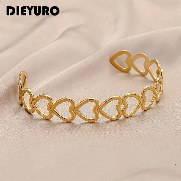 DIEYURO 316L stainless steel hollow heartshaped bracelet suitable for womens fashion gold silver party 250421