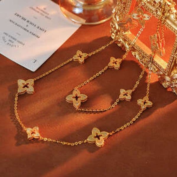 2025 New Four-Leaf Clover Gold Earrings Necklace Bracelet Sweater Chain Women Light Luxury Niche designer luxury