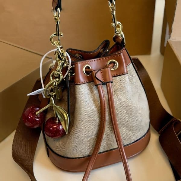 Genuine leather bucket bag top designer bag best-selling handbag high-quality ladies' bag classic drawstring bag practical single-shoulder bag printed bag
