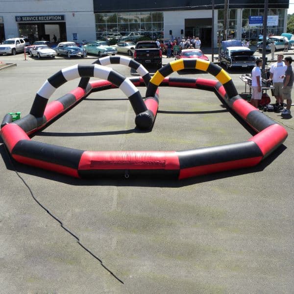 Colorful curved kids inflatable Zorb ball track with three small arches for racing events like kart or bike on sale made in China