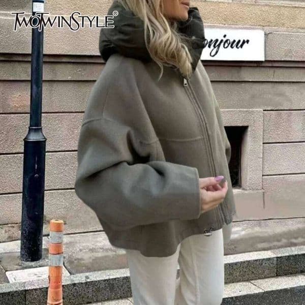 TWOTWINSTYLE Streetwear Casual Coats For Women Stand Collar Hooded Long Sleeve Patchwork Zipper Jackets Female Fashion Clothes