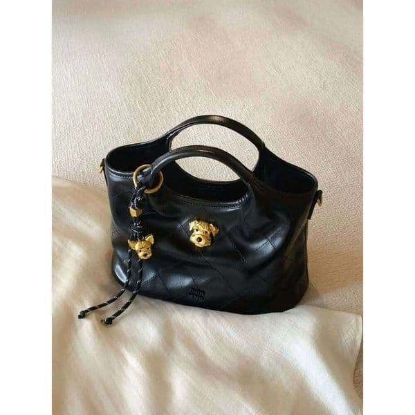 Designer bags Tote bag Women High Quality 2025 New Popular Large Capacity Bucket Handbags For Commuter Shoulder Crossbody Bag With Dog Pendant