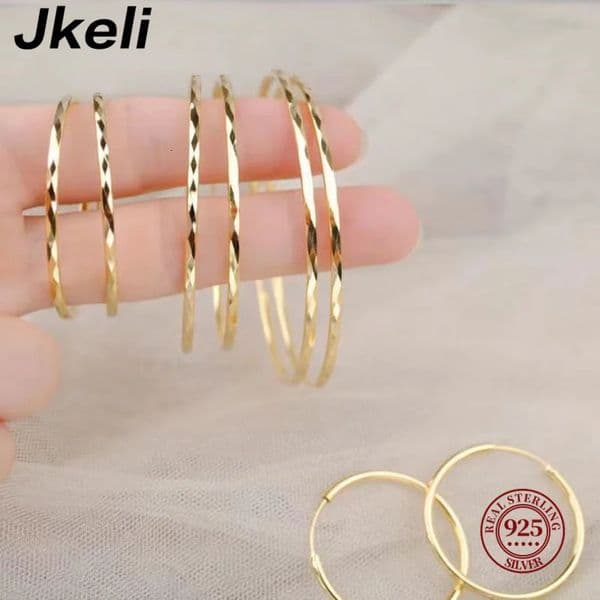 Jkeli Genuine 925 Sterling Silver Fashion Korean Simple Hoop Earrings for Women Men Charming Chic Party Jewelry Accessories 250626