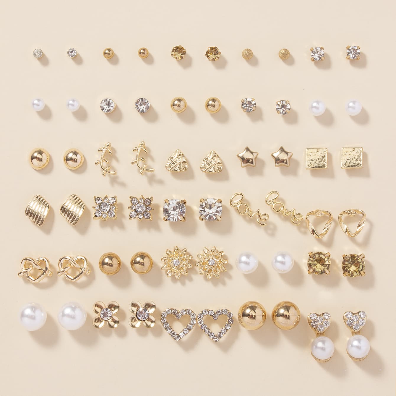 TEMU A Set Of 30 Stylish Heart-shaped Letter Stud Earrings