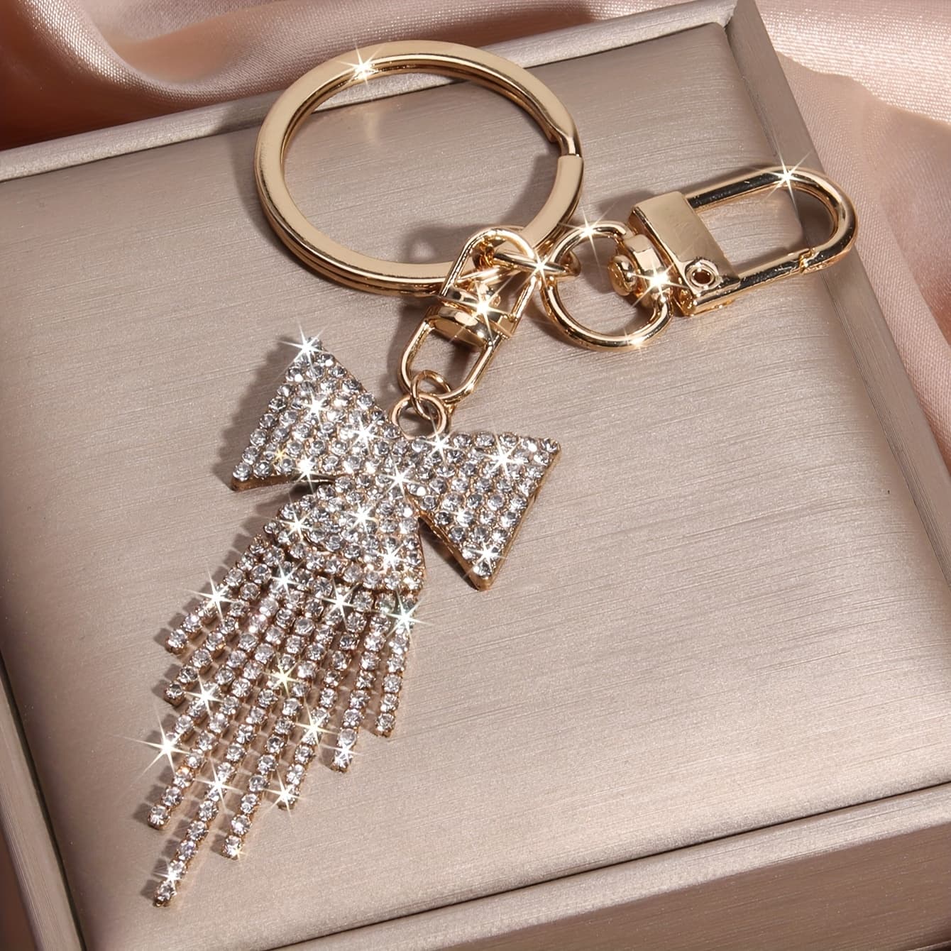 TEMU 1pc -embellished Bow Keychain With Tassel - Golden-tone Metal Car Keyring, Sparkling Bag Charm For Women, Valentine's Day Gift, Fashion Accessory, Stylish Key Organizer, , Glossy Finish