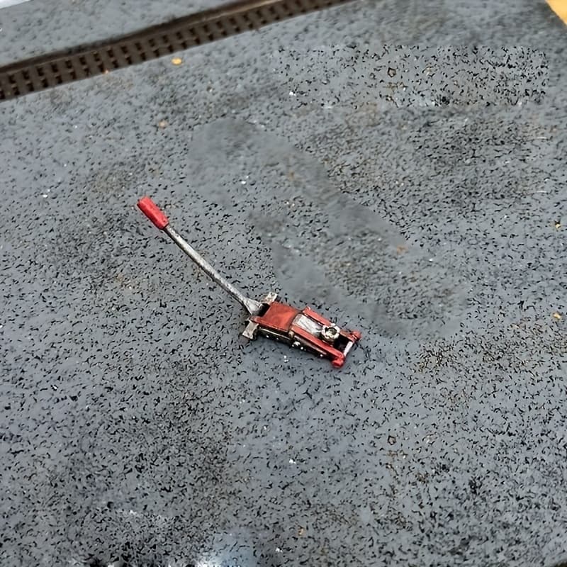 TEMU Scene Arrangement Featuring A Miniature Jack Car Model At A 1/64 Scale