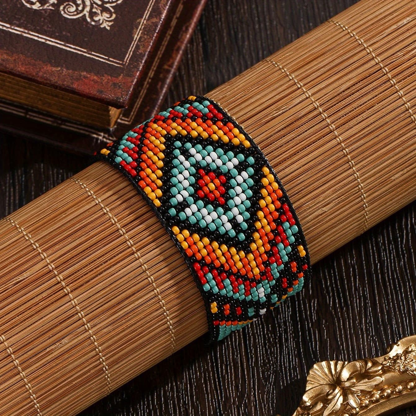 TEMU A Vintage Handmade Woven Bead Bracelet For Men And Women, Featuring A Bohemian Style With Ethnic Characteristics. It Showcases Geometric Colors , Blue, Black, Red, And Orange